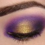 Idea trucco occhi viola e oro