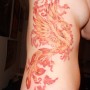 Phoenix tattoo sul fianco