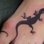 Foto tatuaggio lucertola salamandra