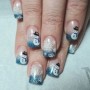 Nail art natalizie con immagini pupazzi di neve