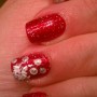 Nail art rosse glitterate natalizie