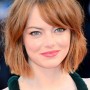 Taglio capelli lunghezza media con frangia a sipario 2015 Emma Stone