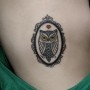 Tatuaggio Gufo dentro ad una cornice